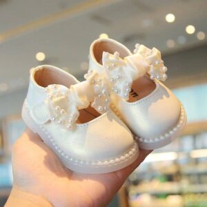 Female white baby shoes
